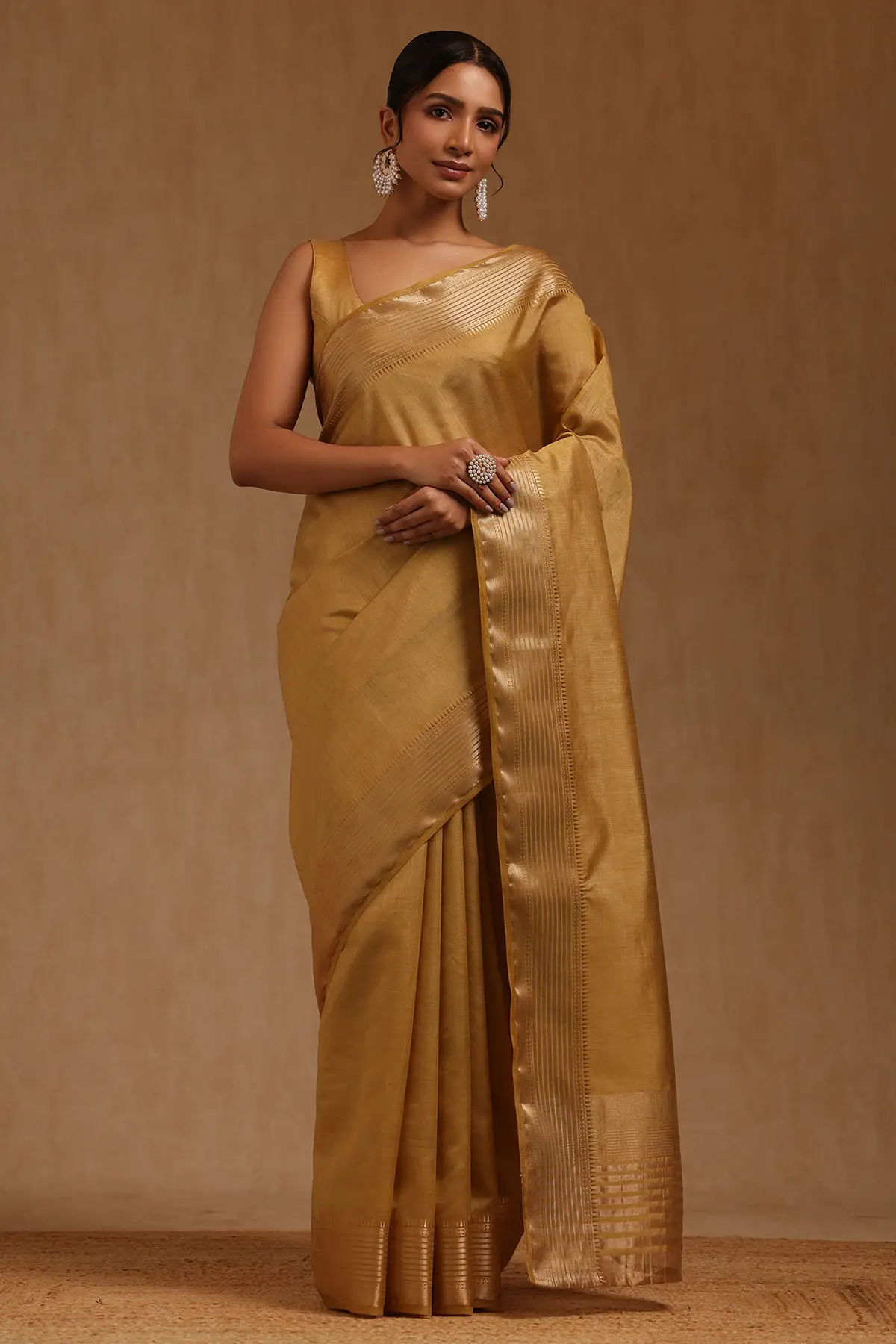 Gold Art Silk Solid Saree With Zari Woven Border